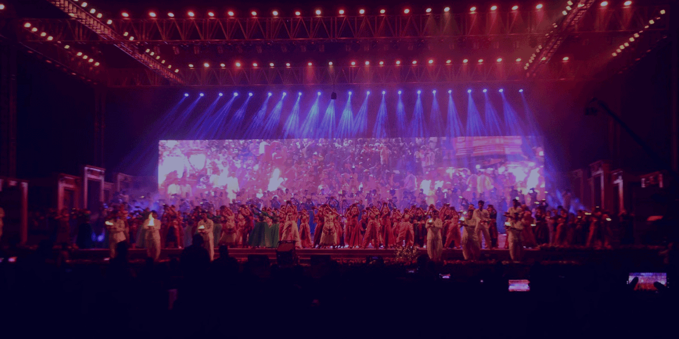 Performers on stage during an Indian cultural event